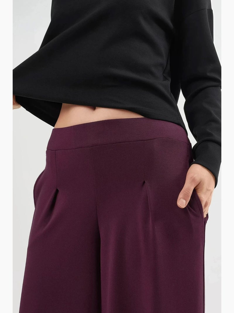 Broek met elastische taille en wijde pijpen busem Bordeauxrood - Kiabi