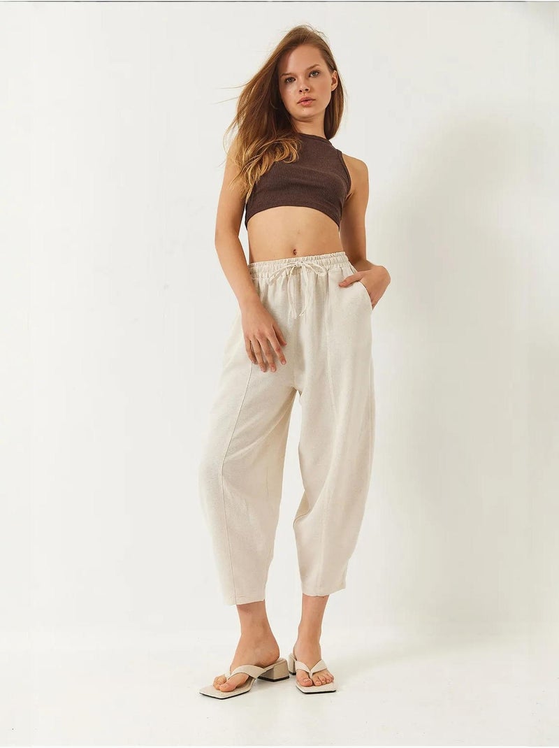 Broek met elastische taille, verlaagd kruis en zakdetail lucci Klei-beige - Kiabi