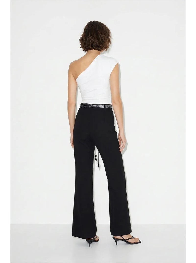 Broek met hoge taille en uitlopende pijpen en ceintuur lucci Zwart - Kiabi