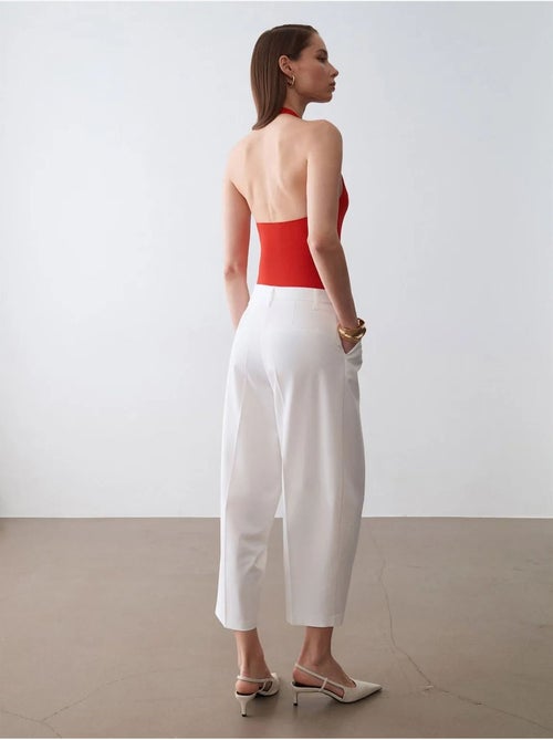 Broek met hoge taille en wijde pijp van crêpe dilvin - Kiabi Broek met hoge taille en wijde pijp van crêpe dilvin - Kiabi