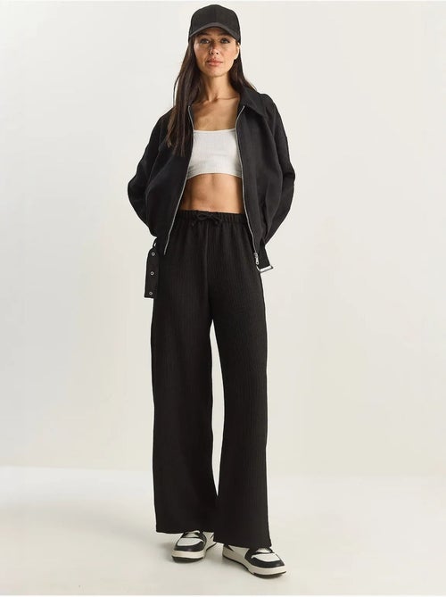 Broek met hoge taille en wijde pijpen lucci - Kiabi Broek met hoge taille en wijde pijpen lucci - Kiabi