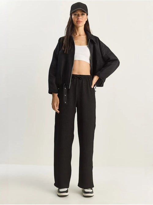 Broek met hoge taille en wijde pijpen lucci - Kiabi Broek met hoge taille en wijde pijpen lucci - Kiabi