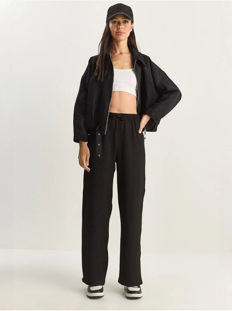 Broek met hoge taille en wijde pijpen lucci Zwart - Kiabi