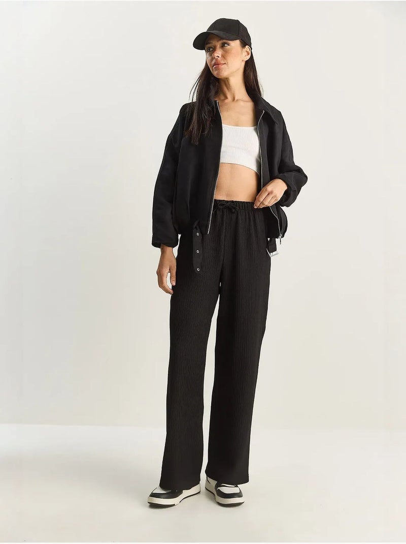 Broek met hoge taille en wijde pijpen lucci Zwart - Kiabi