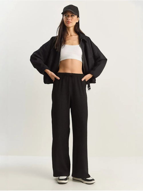 Broek met hoge taille en wijde pijpen lucci - Kiabi Broek met hoge taille en wijde pijpen lucci - Kiabi