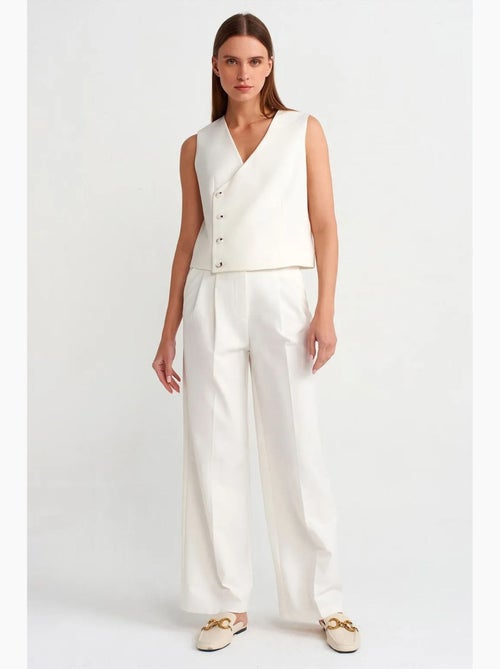 Broek met hoge taille, wijde pijp en riem dilvin - Kiabi Broek met hoge taille, wijde pijp en riem dilvin - Kiabi