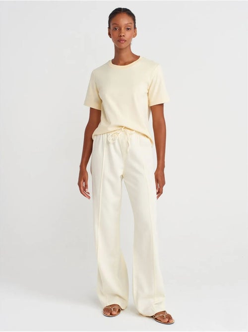 Broek met hoge taille, wijde pijp en strik dilvin - Kiabi Broek met hoge taille, wijde pijp en strik dilvin - Kiabi
