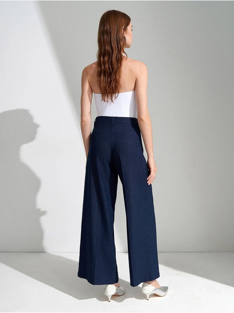 Broek met hoge taille, wijde pijpen en plooien dilvin Marineblauw - Kiabi