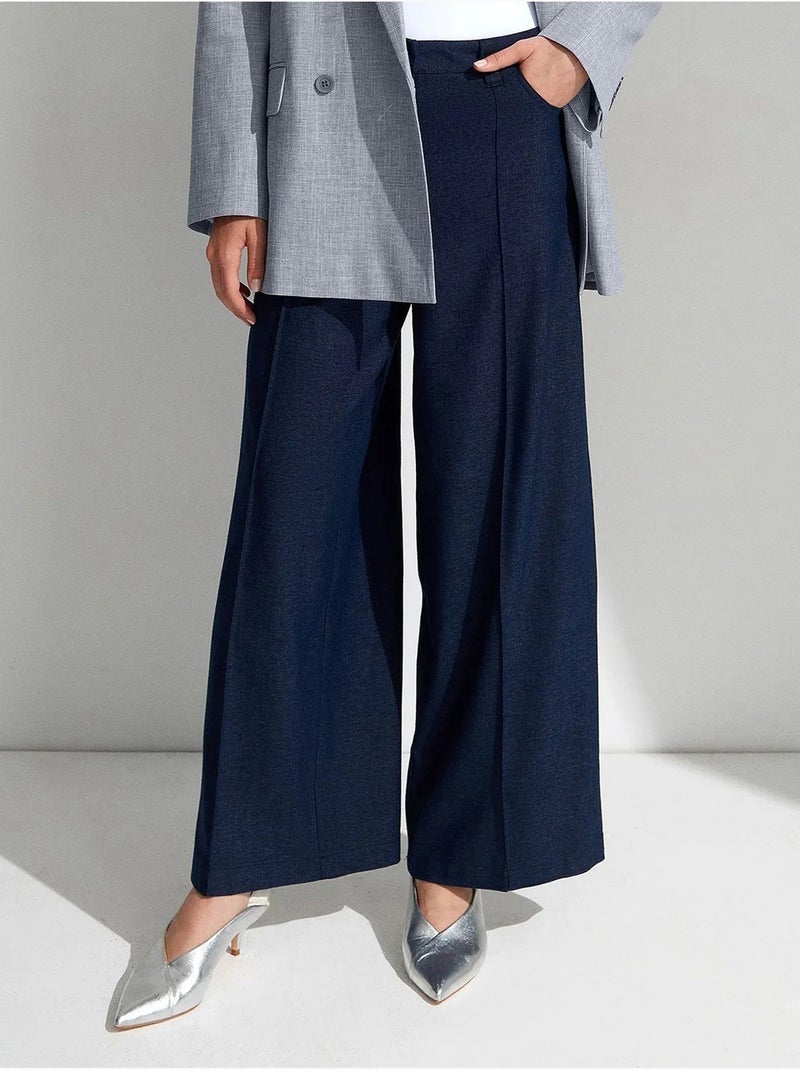 Broek met hoge taille, wijde pijpen en plooien dilvin Marineblauw - Kiabi