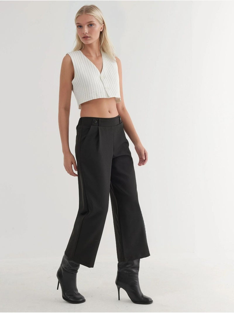Broek met knoopdetail en hoge taille hiccup Zwart - Kiabi