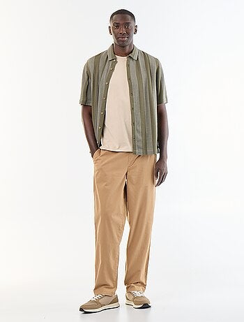 Broek met perzikhuid-effect