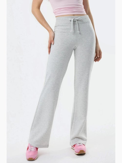 Broek met uitlopende pijpen en elastische taille busem - Kiabi Broek met uitlopende pijpen en elastische taille busem - Kiabi