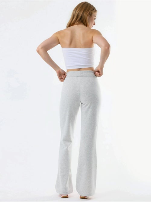Broek met uitlopende pijpen en elastische taille busem - Kiabi Broek met uitlopende pijpen en elastische taille busem - Kiabi