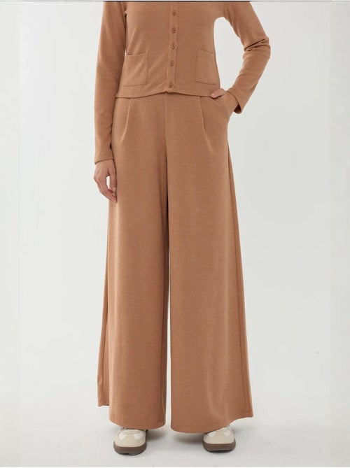 Broek met wijde pijpen en elastische taille - Kiabi Broek met wijde pijpen en elastische taille - Kiabi