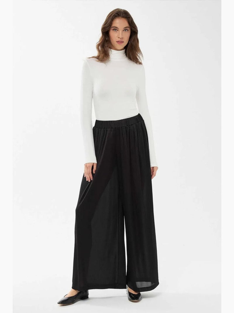 Broek met wijde pijpen en elastische taille hiccup Zwart - Kiabi