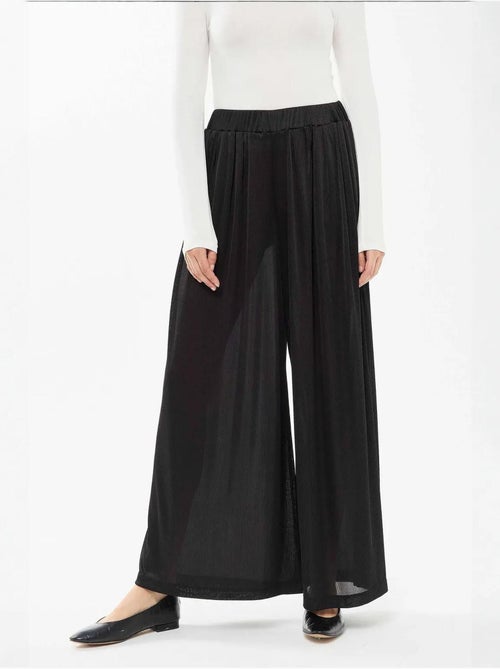 Broek met wijde pijpen en elastische taille - Kiabi Broek met wijde pijpen en elastische taille - Kiabi
