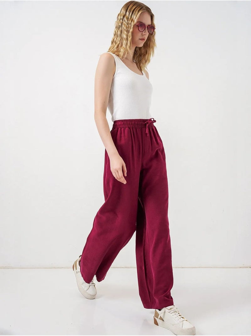 Broek met wijde pijpen, hoge taille en zak bdart Bordeauxrood - Kiabi