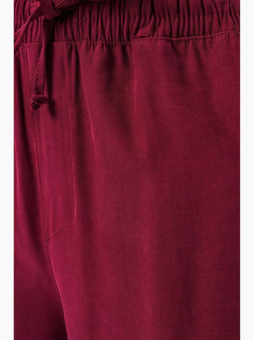 Broek met wijde pijpen, hoge taille en zak bdart - Kiabi Broek met wijde pijpen, hoge taille en zak bdart - Kiabi