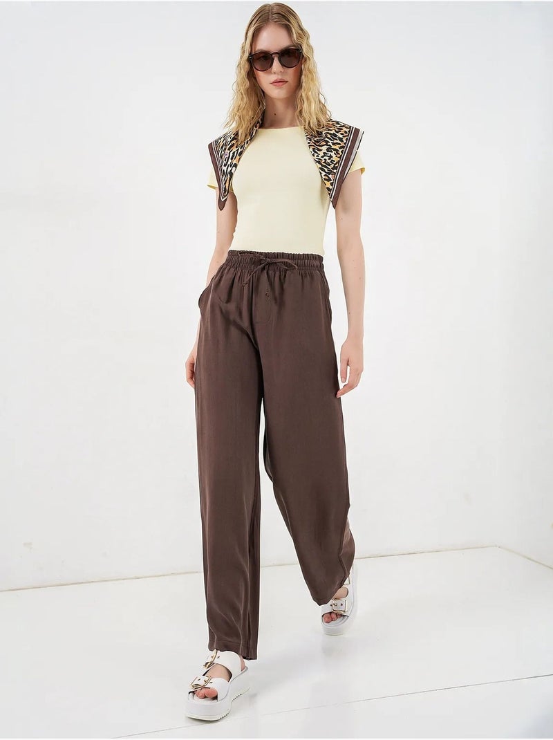 Broek met wijde pijpen, hoge taille en zak bdart Chocoladebruin - Kiabi