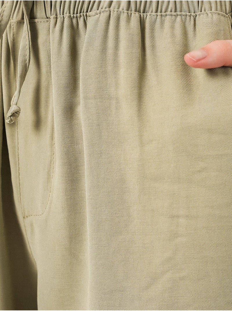 Broek met wijde pijpen, hoge taille en zak bdart Kaki - Kiabi