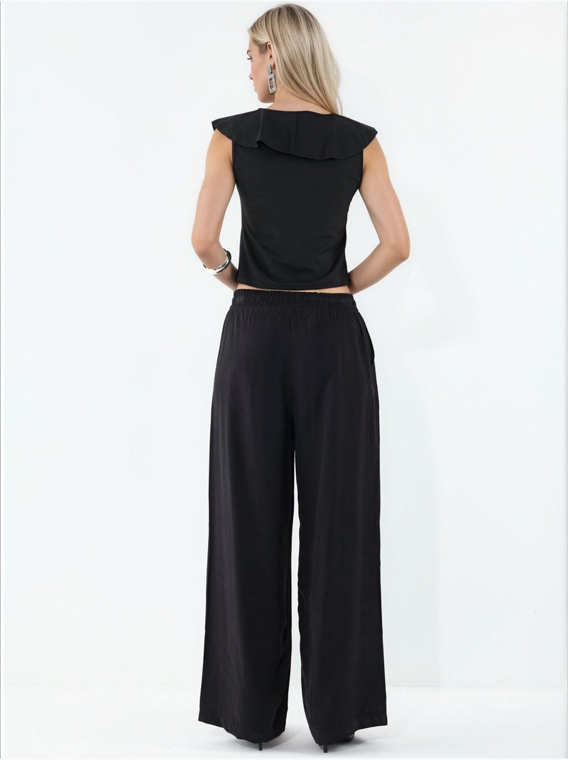 Broek met wijde pijpen, hoge taille en zak bdart Zwart - Kiabi