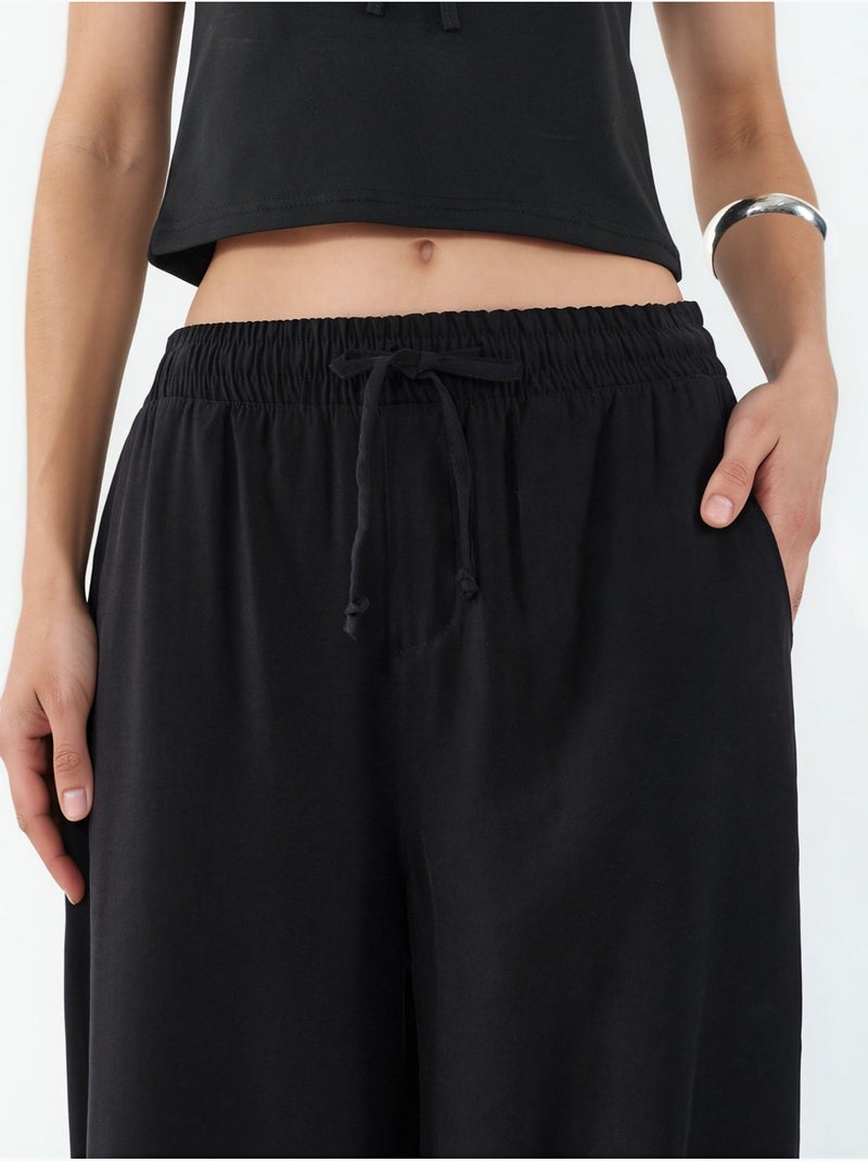 Broek met wijde pijpen, hoge taille en zak bdart Zwart - Kiabi