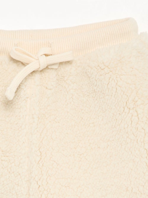 Broek van stof met schapenvachteffect - Kiabi Broek van stof met schapenvachteffect - Kiabi