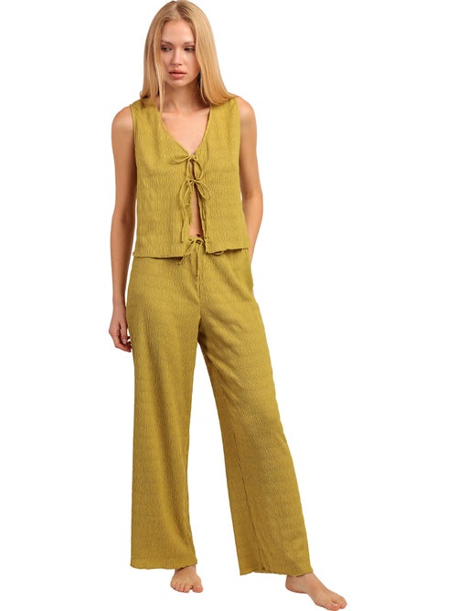 Broekpak en mouwloze top halter style - Kiabi Broekpak en mouwloze top halter style - Kiabi