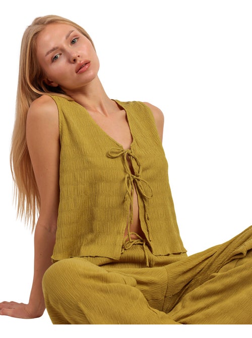 Broekpak en mouwloze top halter style - Kiabi Broekpak en mouwloze top halter style - Kiabi