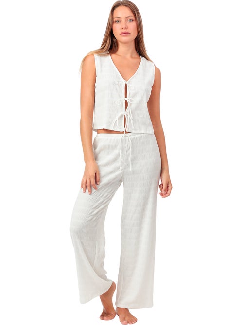Broekpak en mouwloze top halter style - Kiabi Broekpak en mouwloze top halter style - Kiabi