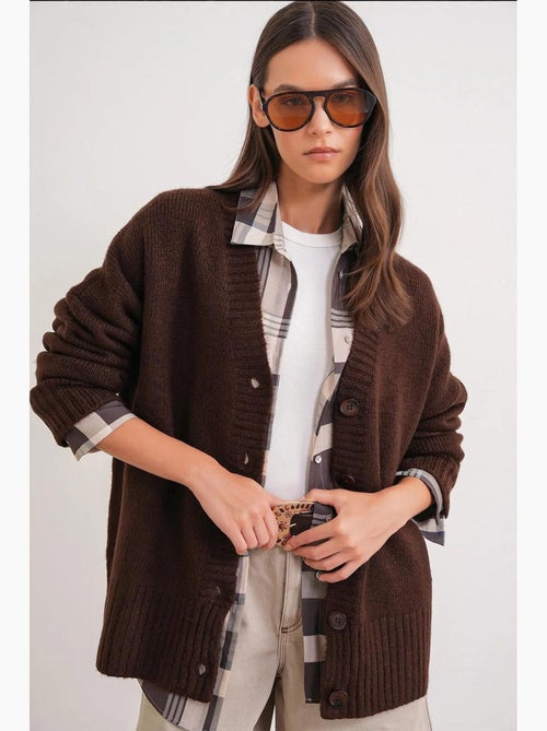 Button-up v-hals geribd gebreid vest met knopen mixray - Kiabi Button-up v-hals geribd gebreid vest met knopen mixray - Kiabi