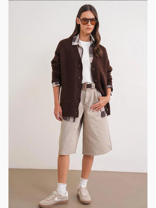Button-up v-hals geribd gebreid vest met knopen mixray - Kiabi Button-up v-hals geribd gebreid vest met knopen mixray - Kiabi