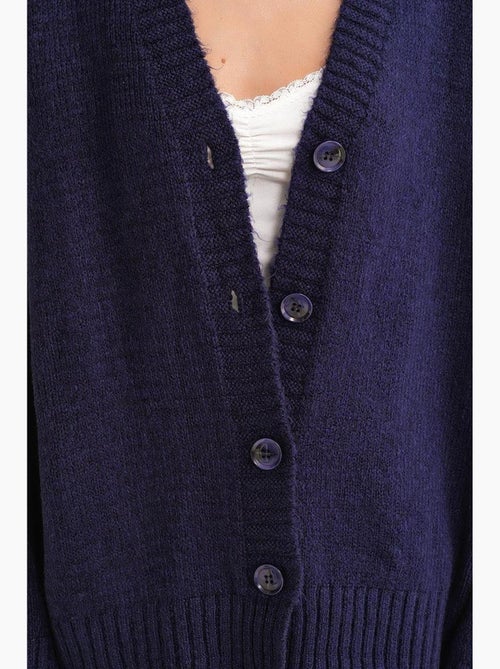 Button-up v-hals geribd gebreid vest met knopen mixray - Kiabi Button-up v-hals geribd gebreid vest met knopen mixray - Kiabi