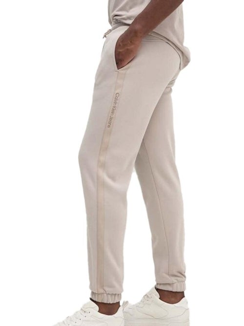 Calvin Klein Jeans Beige Joggingbroek Dames met Logotape - Kiabi Calvin Klein Jeans Beige Joggingbroek Dames met Logotape - Kiabi