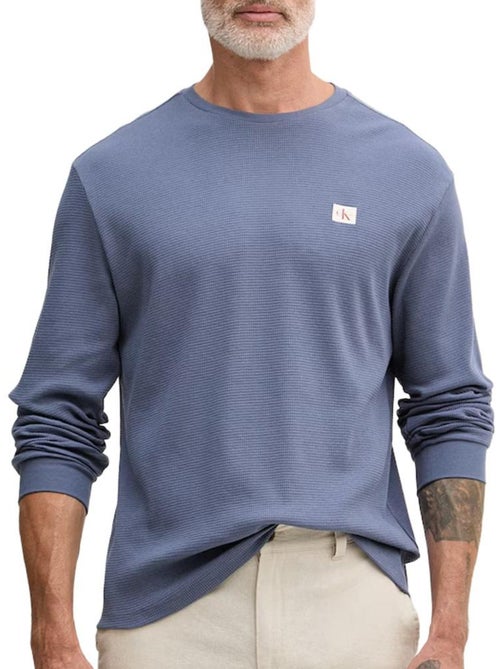 Calvin Klein Jeans Heren Sweatshirt Blauw met Wafelstructuur en Badges - Kiabi Calvin Klein Jeans Heren Sweatshirt Blauw met Wafelstructuur en Badges - Kiabi