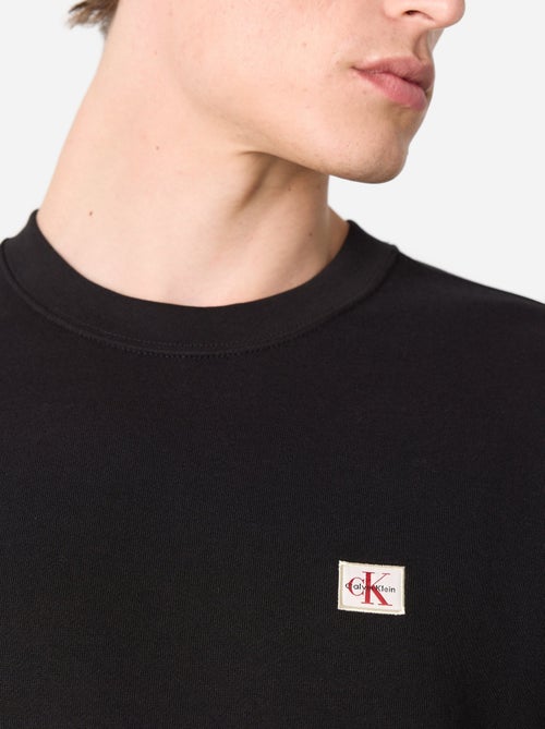 Calvin Klein Jeans Heren Sweatshirt Zwart met Badge - Kiabi Calvin Klein Jeans Heren Sweatshirt Zwart met Badge - Kiabi