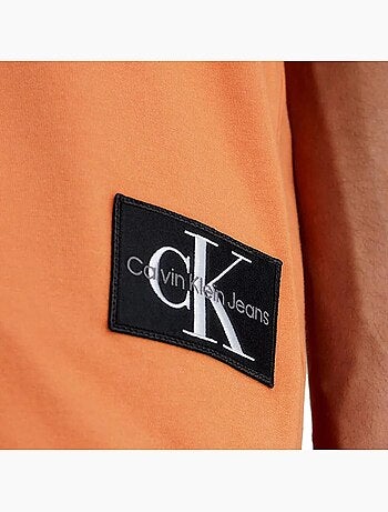 Calvin klein jeans t-shirt oranje heren met badge en opgestikte mouwen