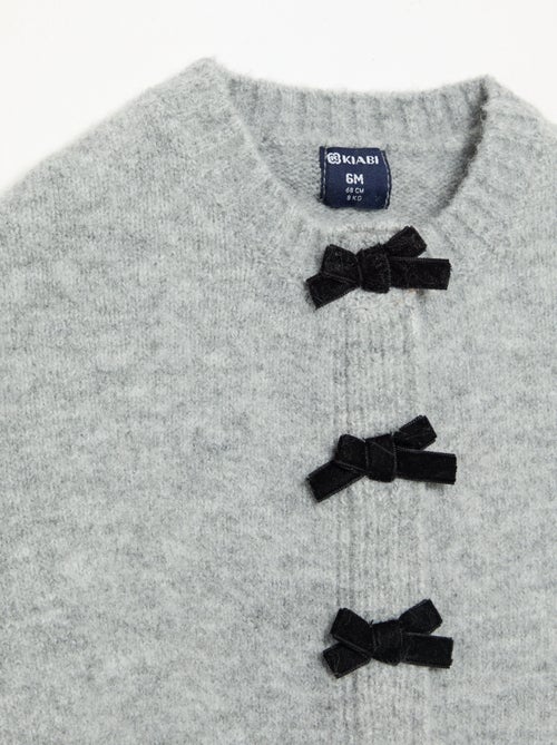 Cape en tricot avec nœuds en velours - Kiabi