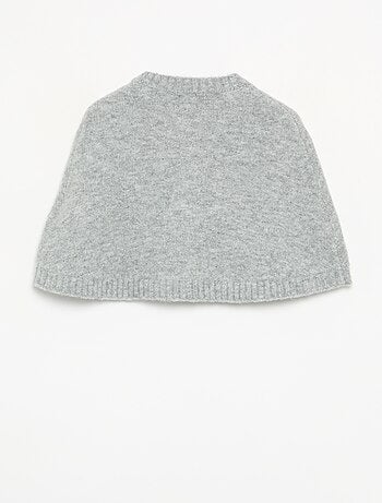 Cape van tricot met fluwelen strikken
