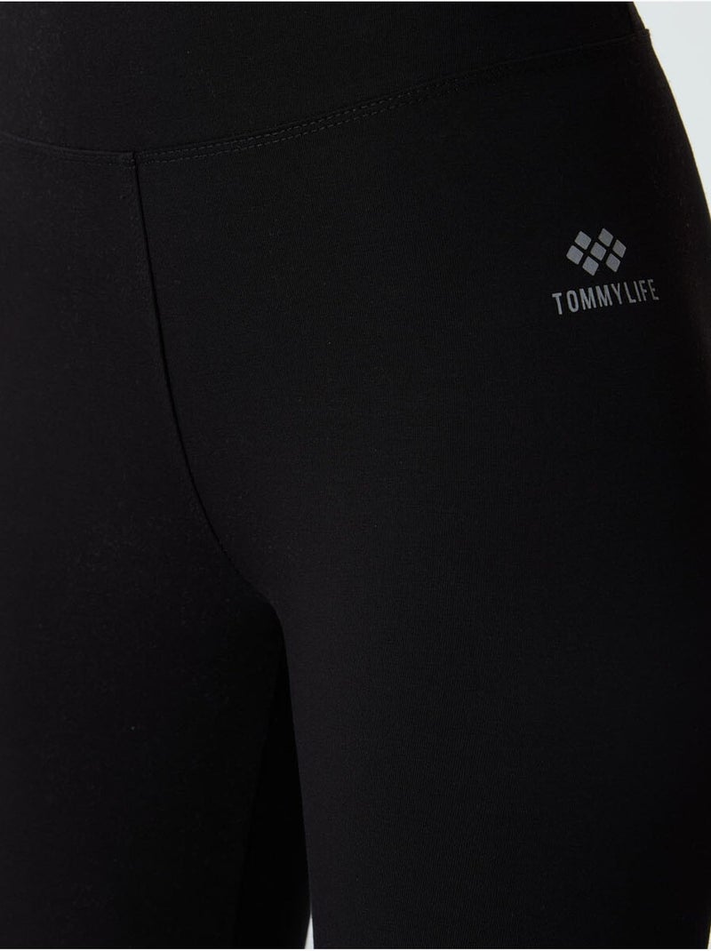 Capri legging met hoge taille tommy Zwart - Kiabi