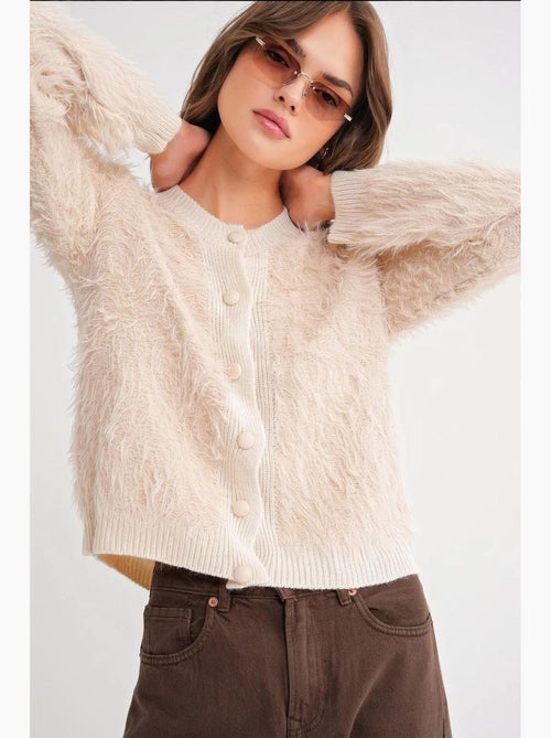 Cardigan met knopen en pluche textuur mixray - Kiabi Cardigan met knopen en pluche textuur mixray - Kiabi