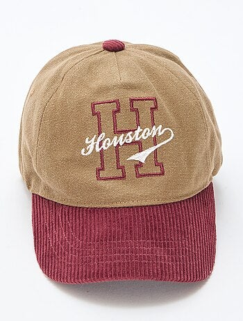 Casquette avec visière en matière côtelée