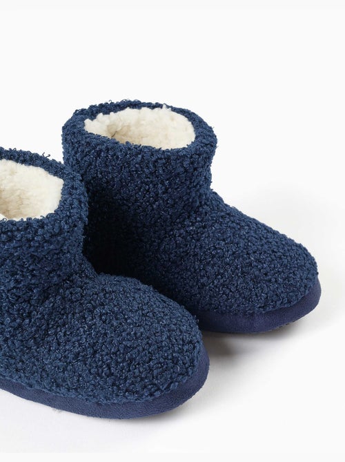 Chaussons montants en sherpa avec semelle antidérapante - Kiabi Chaussons montants en sherpa avec semelle antidérapante - Kiabi