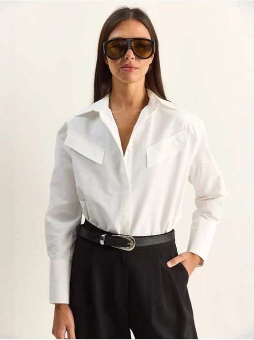 Chemise décontractée en popeline boutonnée à manches longues avec poche lucci - Kiabi Chemise décontractée en popeline boutonnée à manches longues avec poche lucci - Kiabi
