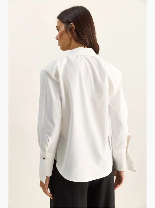 Chemise décontractée en popeline boutonnée à manches longues avec poche lucci - Kiabi Chemise décontractée en popeline boutonnée à manches longues avec poche lucci - Kiabi