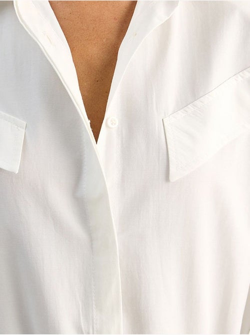 Chemise décontractée en popeline boutonnée à manches longues avec poche lucci - Kiabi Chemise décontractée en popeline boutonnée à manches longues avec poche lucci - Kiabi