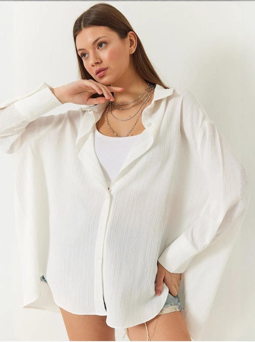Chemise froissée basique surdimensionnée à épaules dénudées lucci - Kiabi Chemise froissée basique surdimensionnée à épaules dénudées lucci - Kiabi