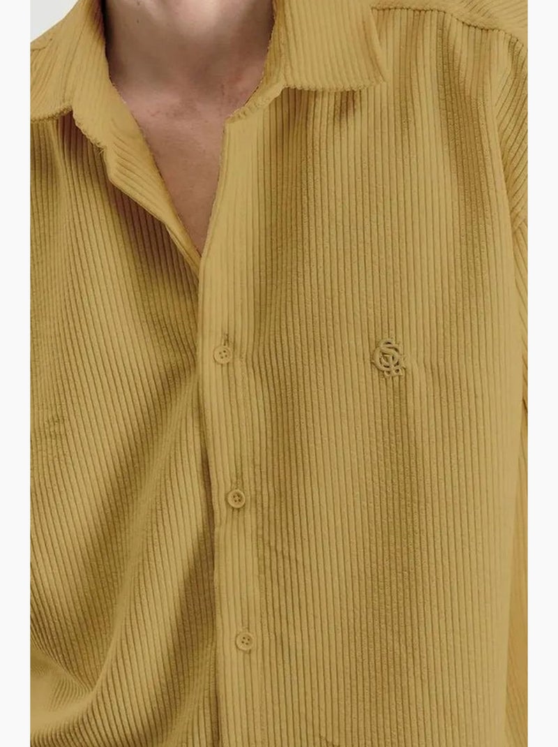 Chemise oversize à manches longues et boutons en velours giesto Ambre - Kiabi