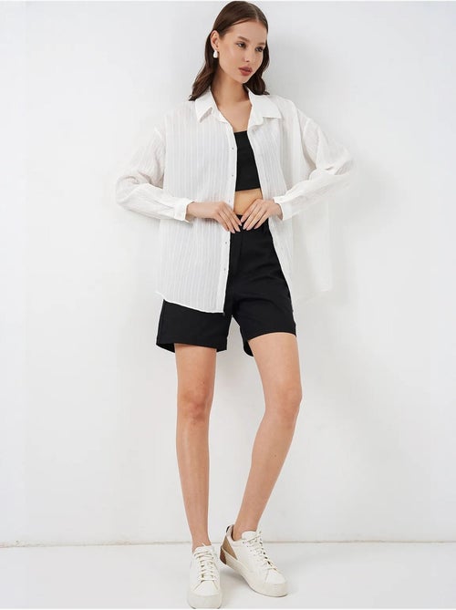 Chemise oversize texturée à rayures avec fermeture à boutons bdart - Kiabi Chemise oversize texturée à rayures avec fermeture à boutons bdart - Kiabi