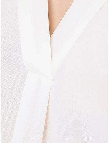Chemise sans manches semi-transparente à col en V